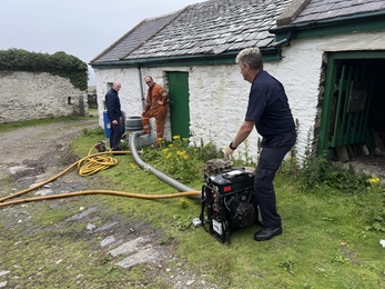 Fire fighters demonstrating equipment on the Calf