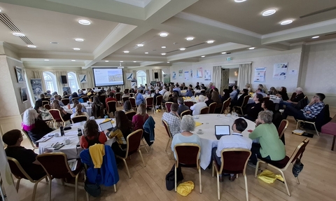 IIEM25 showing a packed conference room