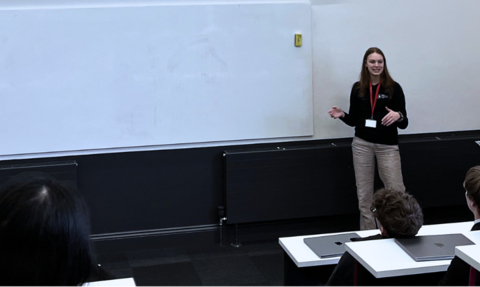 Beth giving a talk to highschool students