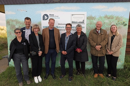 8 people including MWT patrons, CEO and Chair stood outside the Ayres Nature Discovery Centre